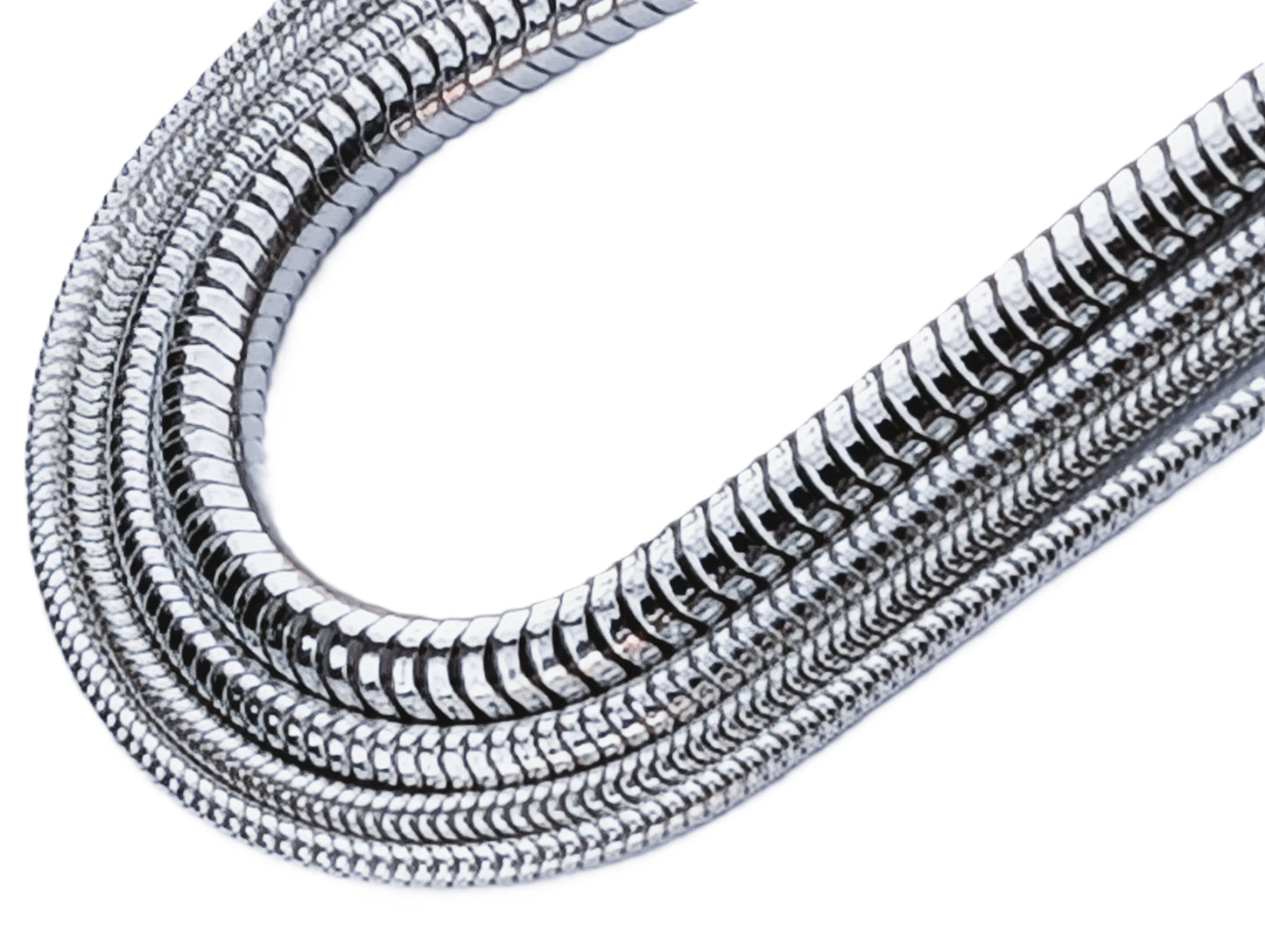 Metallic snake chain on a white background
