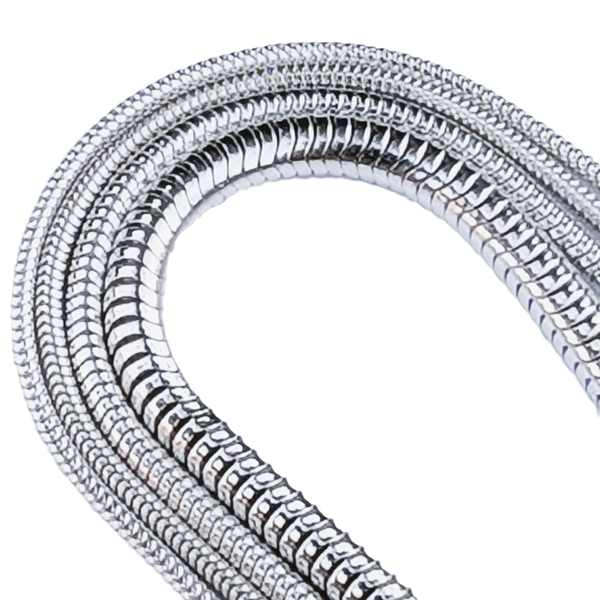 Close-up of a coiled silver snake-shaped object on a white background